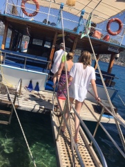 Girls boarding boat